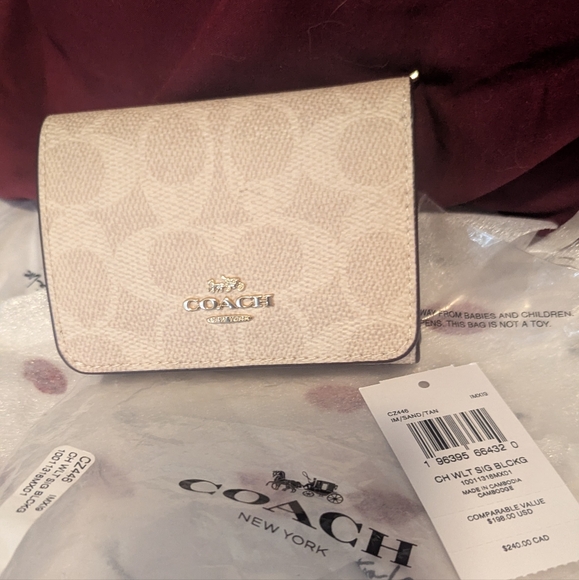 Coach Cream Wristlet - Picture 1 of 6